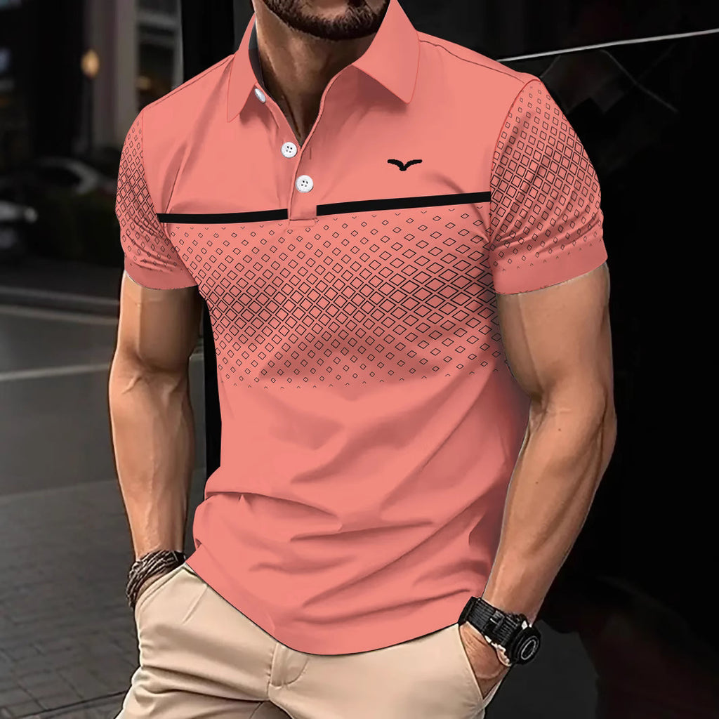 Man wearing a pink polo shirt with geometric pattern and brand logo.
