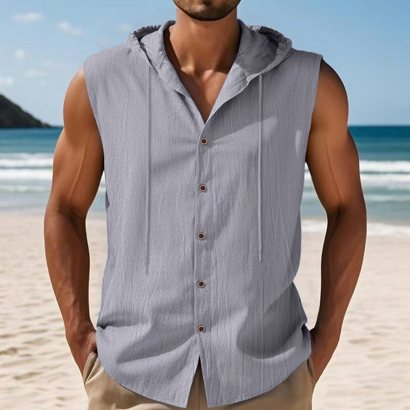 Man wearing a sleeveless hooded shirt on a beach
