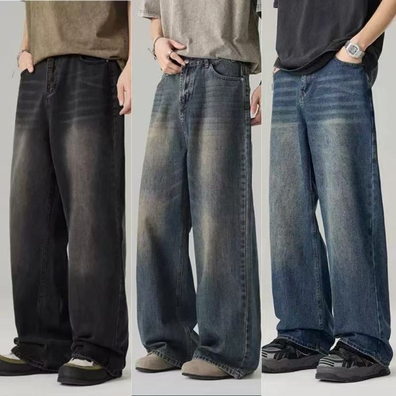 Three pairs of wide-leg jeans in different colors on a plain background