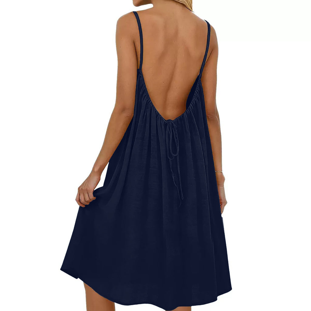 Navy blue sleeveless dress with open back on a white background