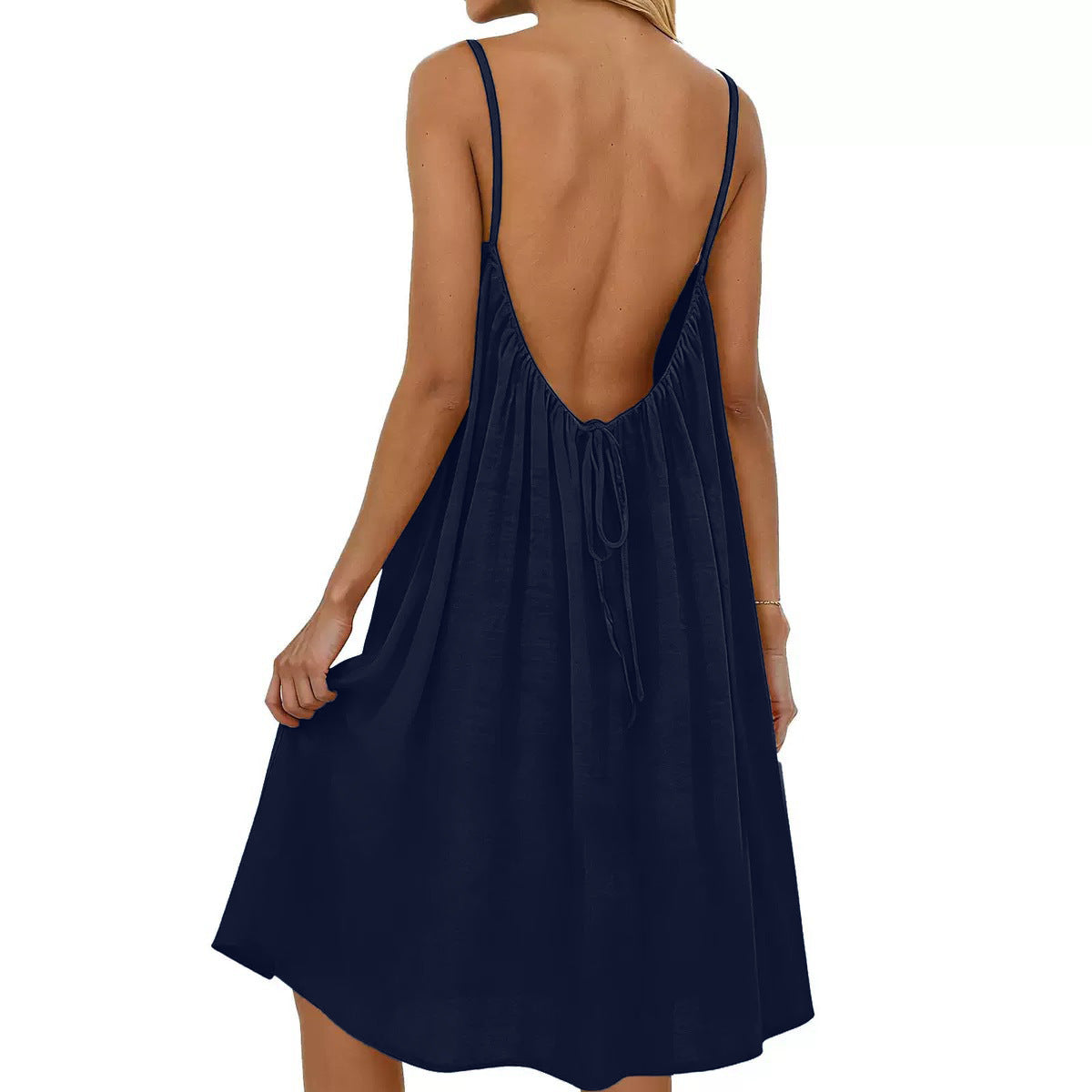 Navy blue sleeveless dress with open back on a white background