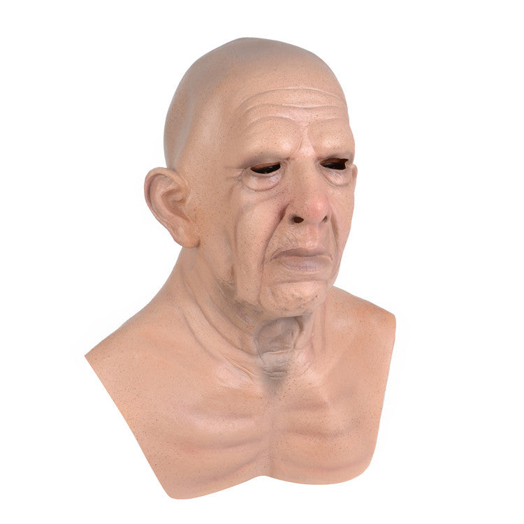 A realistic bald man's head and upper chest latex mask with detailed wrinkles, dark eyes, and a grimacing expression, isolated on a white background.