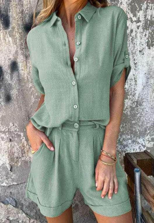 Woman wearing sage green short sleeve button-up shirt and matching high-waisted shorts from ZA-Zola