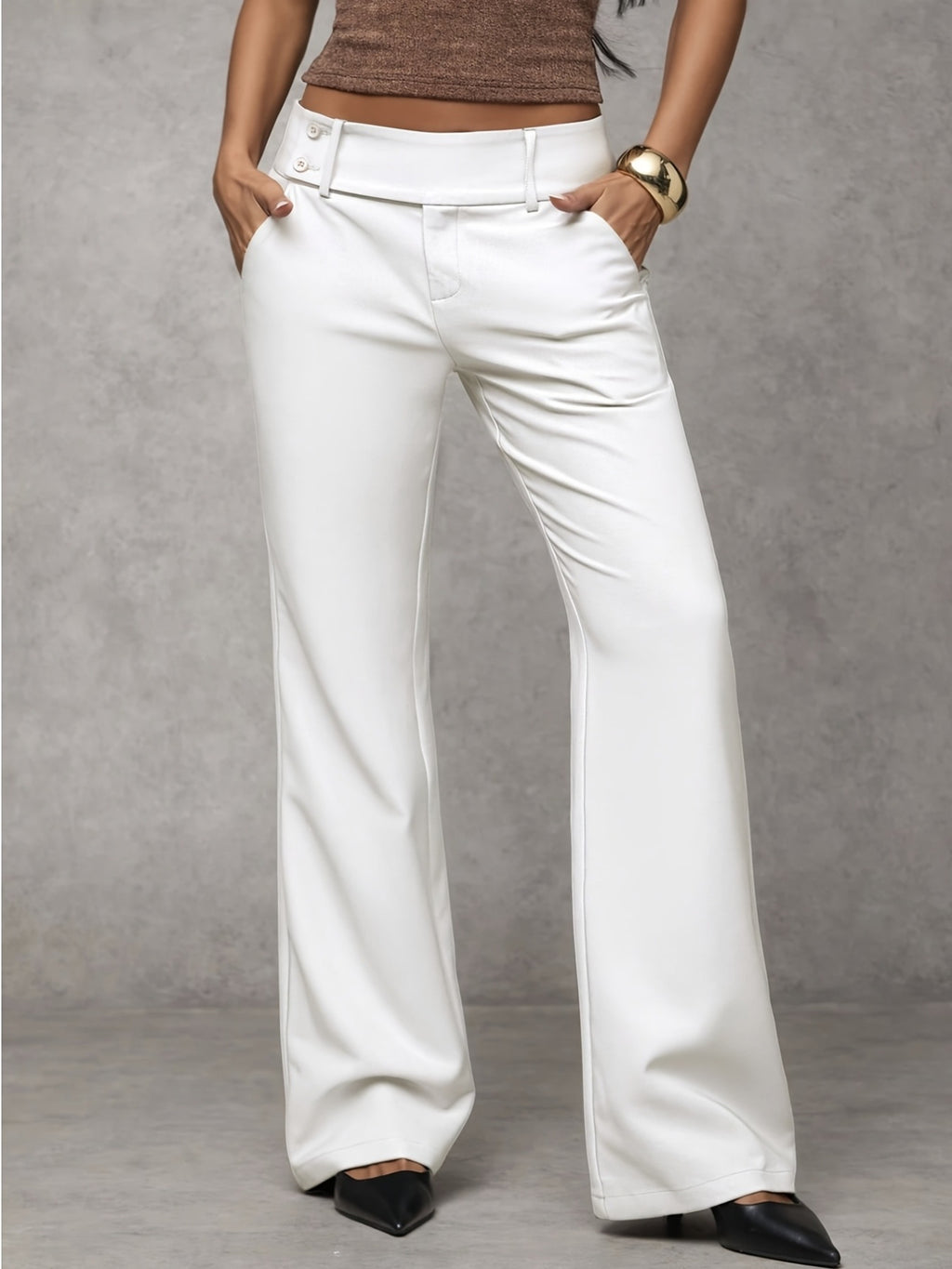 White wide-leg pants worn by a person on a gray background