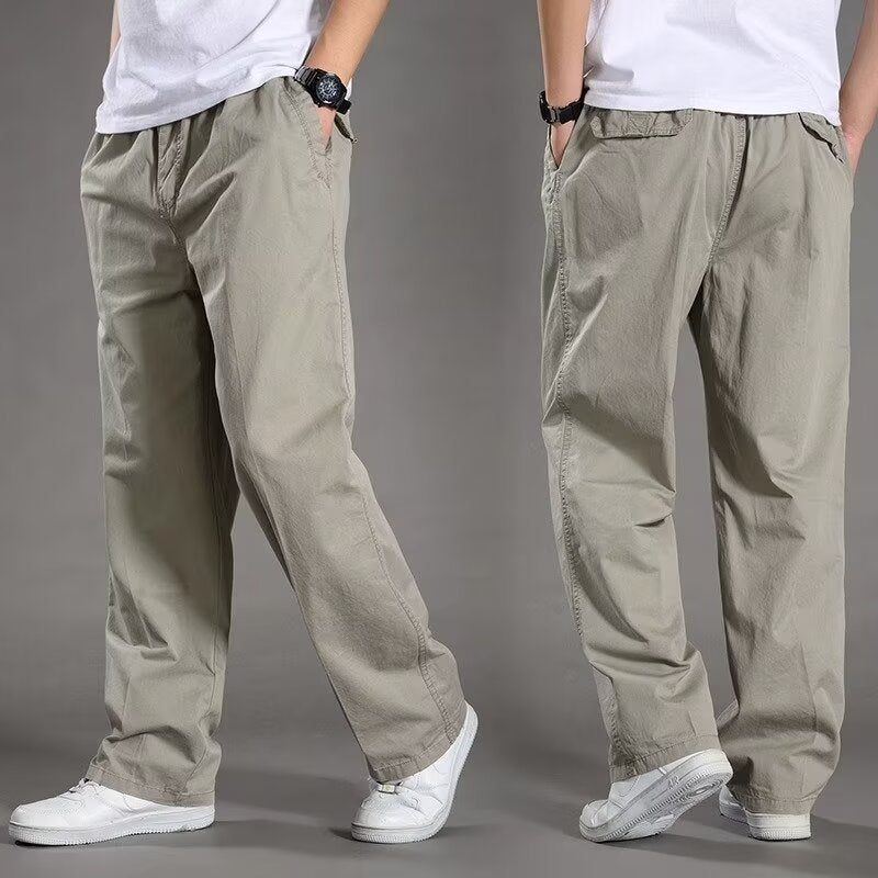 Two pairs of gray pants worn by models on a plain background