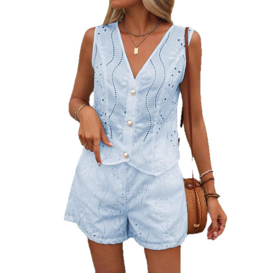 Light blue sleeveless top and shorts set on a white background