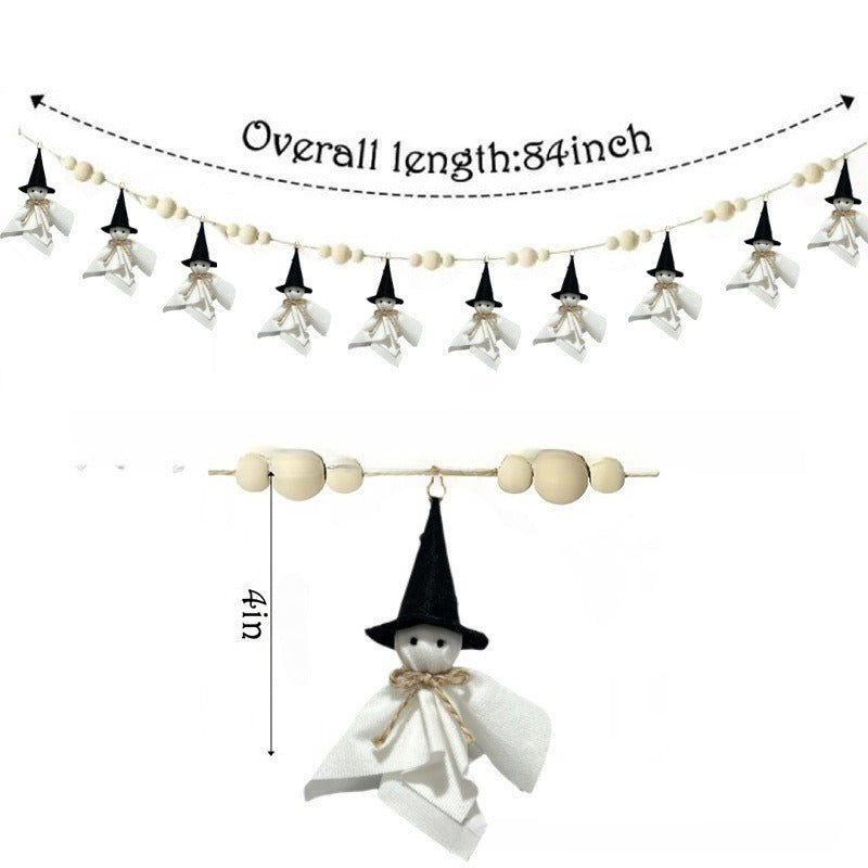 Halloween witch garland banner with wooden beads, black pointed hats, and white cloaks, shown with dimension annotations indicating an overall length of 84 inches and a hanging height of 4 inches.
