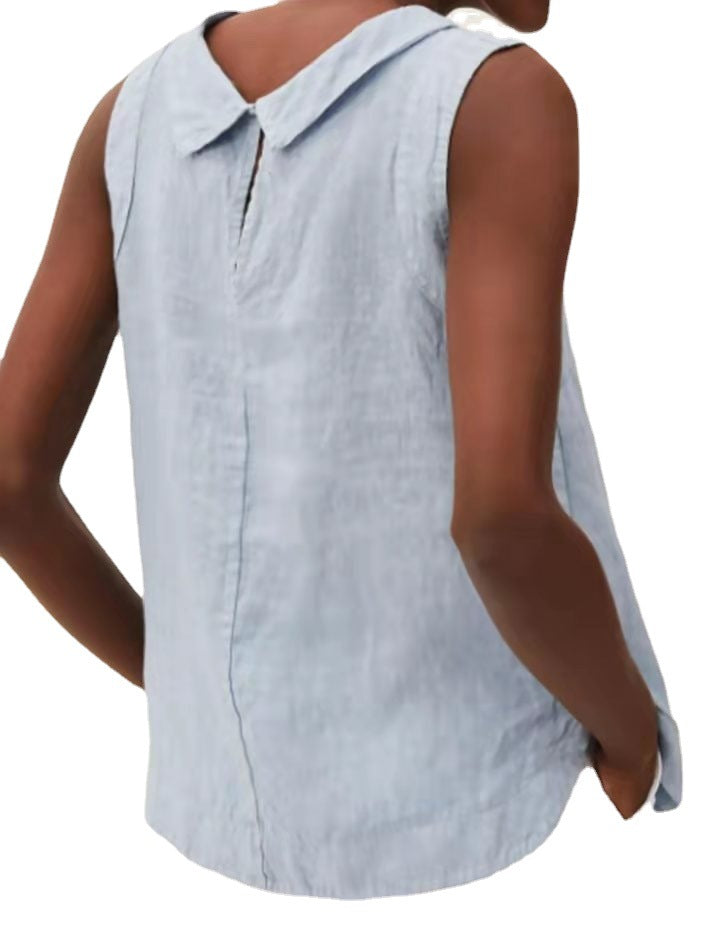 Light blue sleeveless shirt worn by a person on a white background