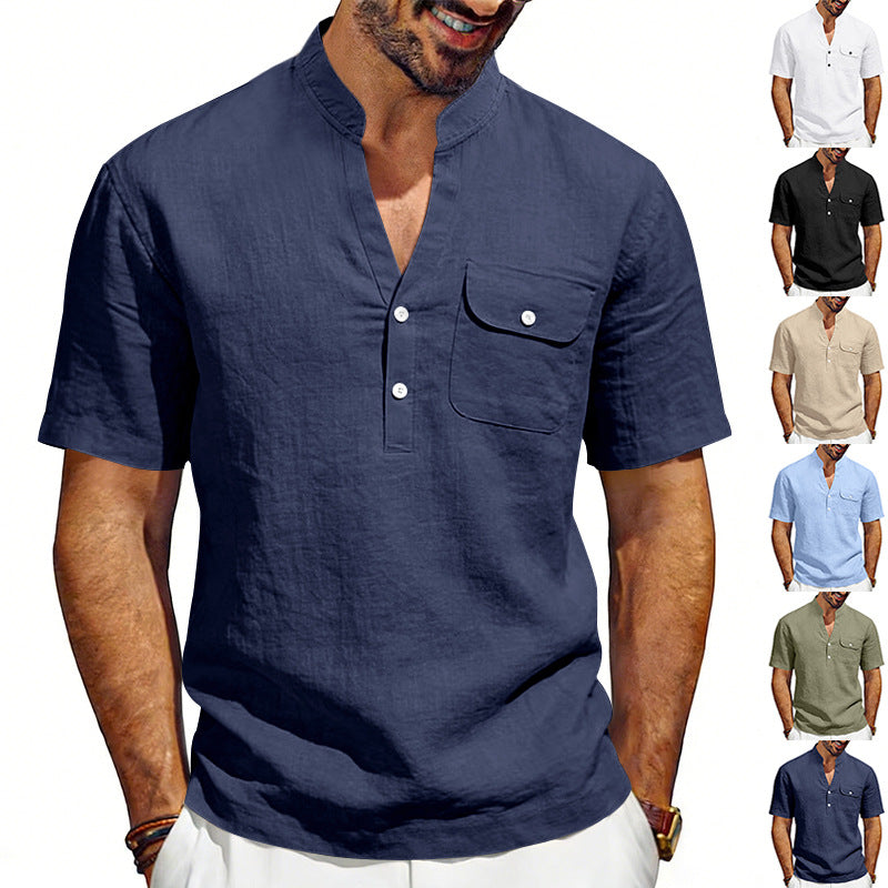 Man wearing a navy blue short-sleeve shirt with a pocket, surrounded by other color options on a white background.