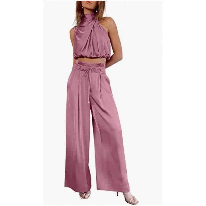 Woman wearing a pink satin halter crop top and wide-leg pants set from ZA-Zola fashion UK