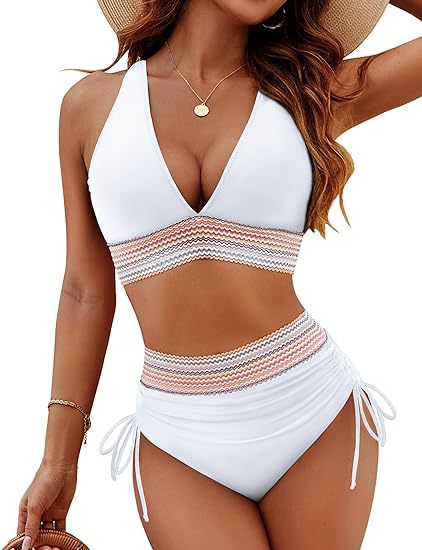 White bikini with striped design worn by a model on a white background