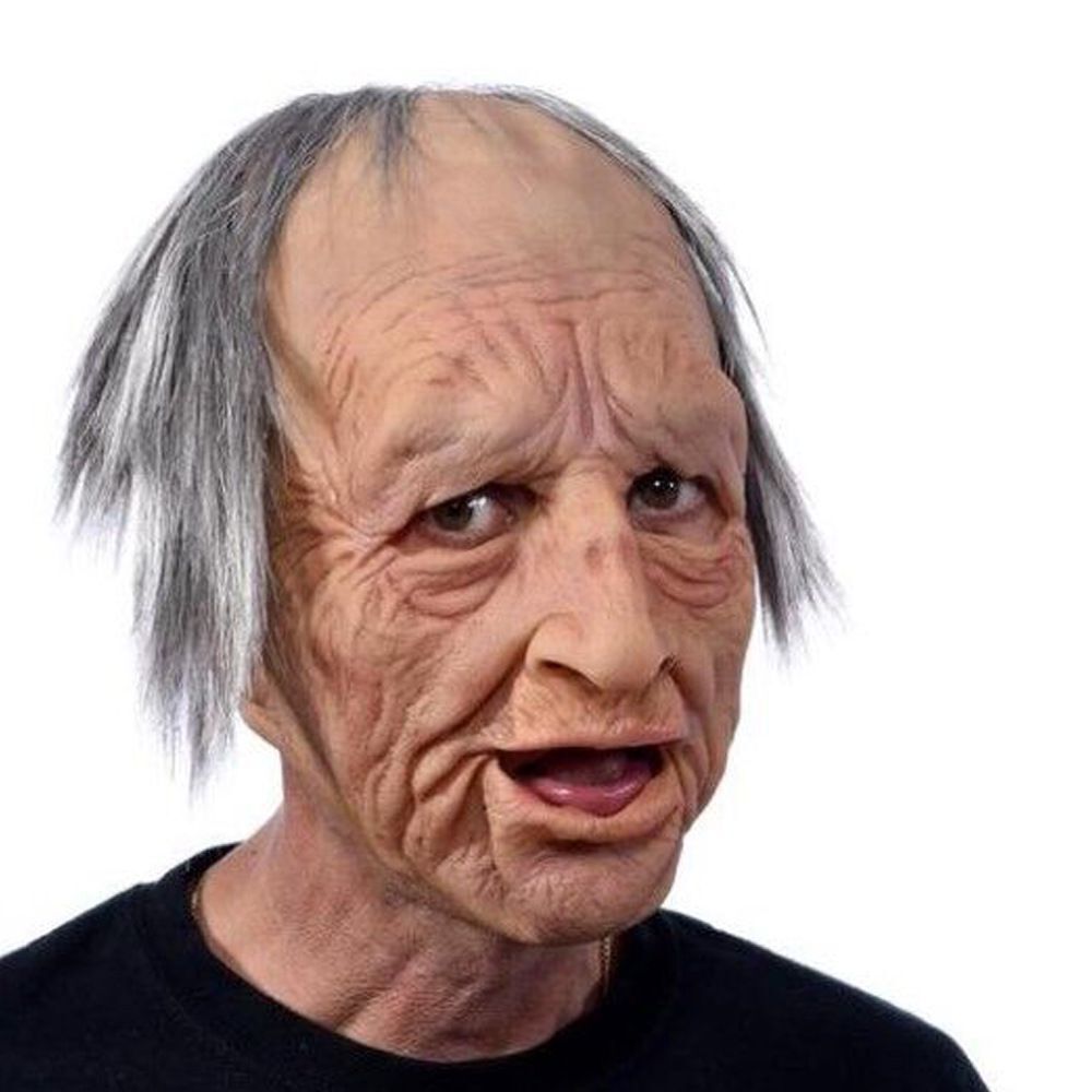Older person wearing a realistic aging mask on a white background