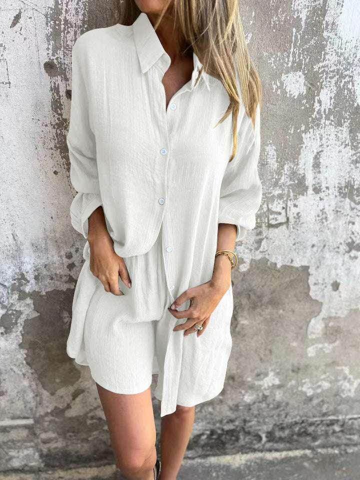 Woman wearing a white button-up shirt and shorts set, stylish ZA-Zola fashion outfit.