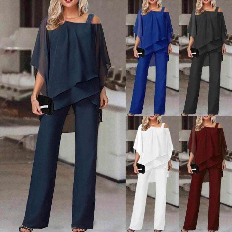 ZA-Zola women's chiffon layered pantsuit in navy, blue, black, white, and burgundy, displayed indoors