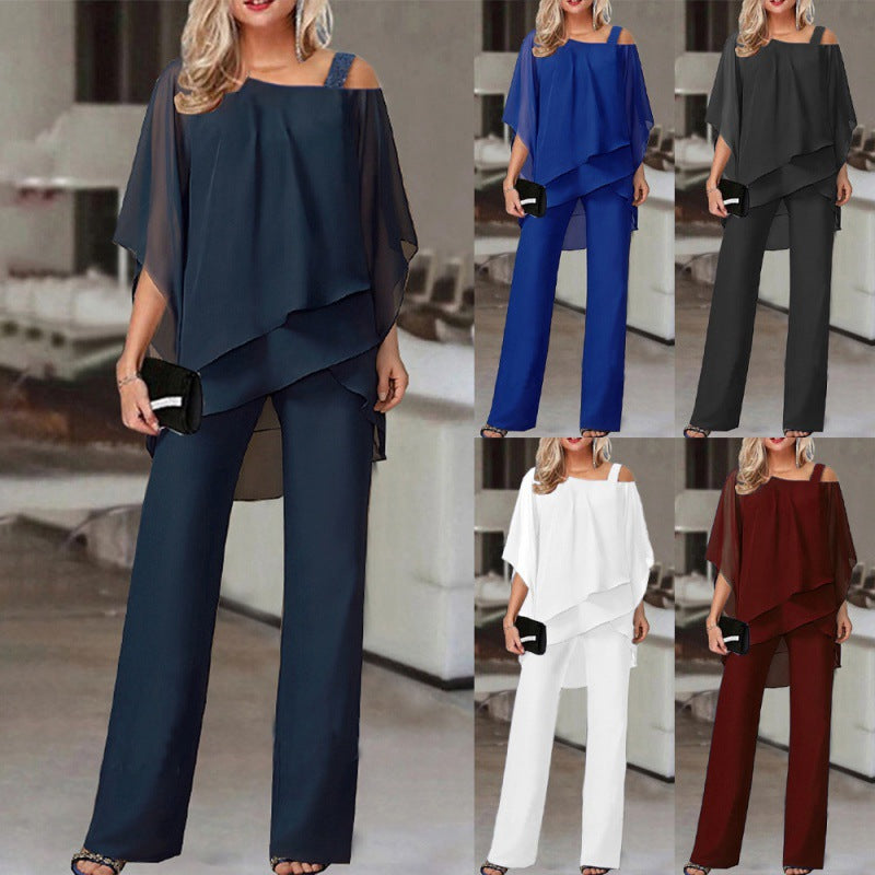 Woman modeling a two-piece outfit with a top and wide-leg pants in various colors.