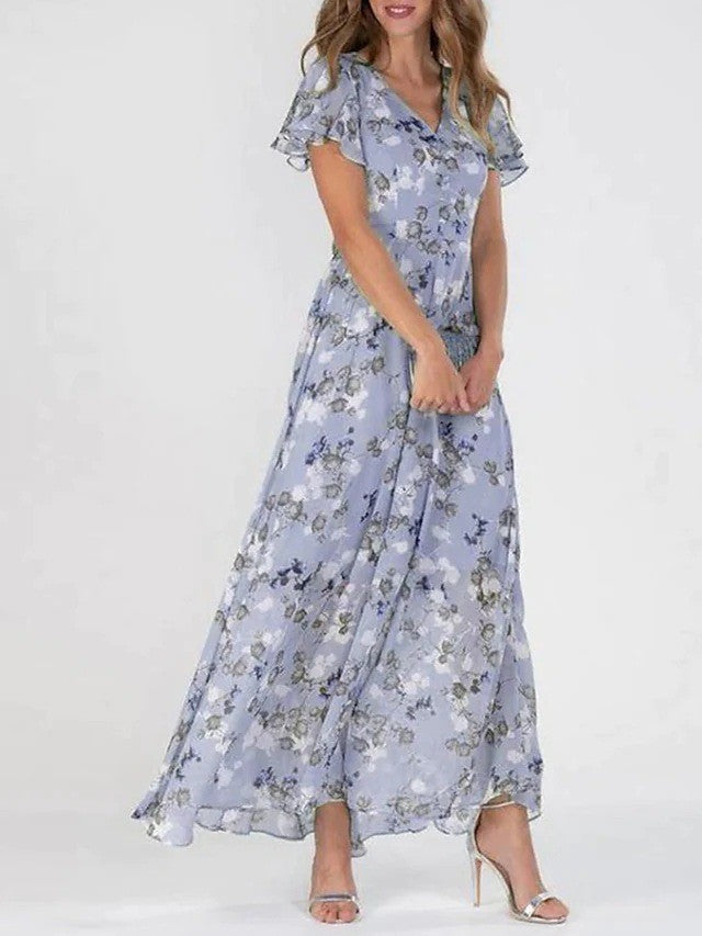 Woman wearing a floral dress on a white background