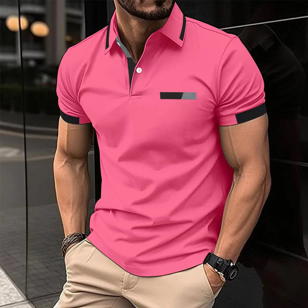 Man wearing a pink polo shirt with black accents in an urban setting