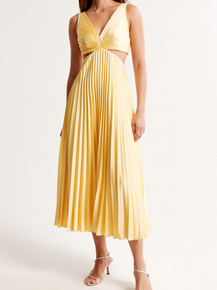 Yellow pleated dress on a white background