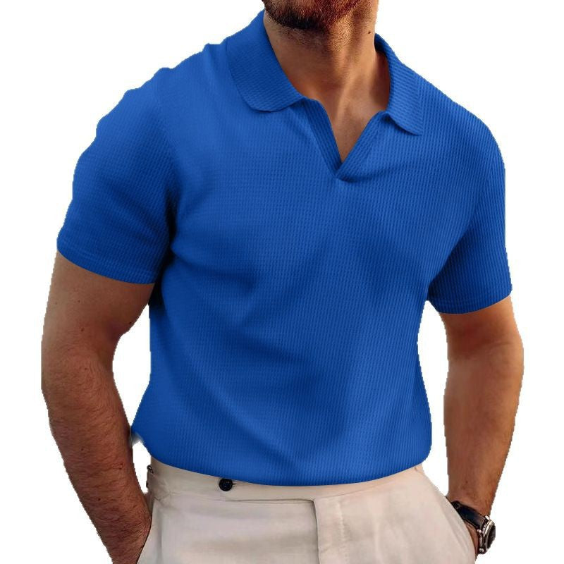 Man wearing a blue polo shirt on a white background