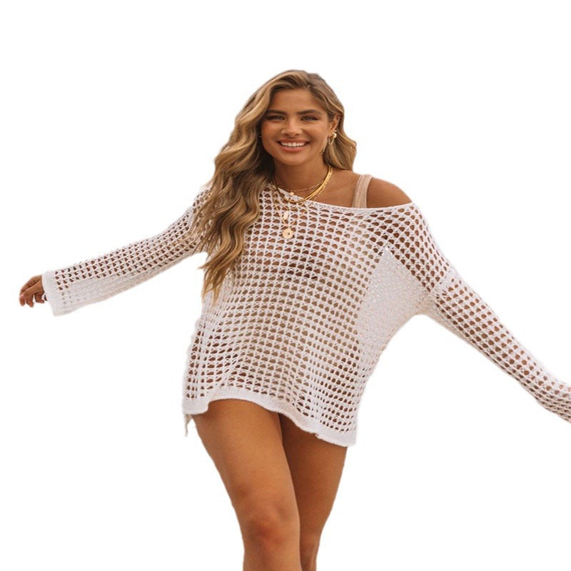 Woman wearing a beige crochet cover-up on a white background