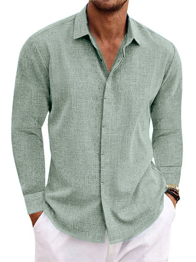 Green button-up shirt worn by a person on a white background