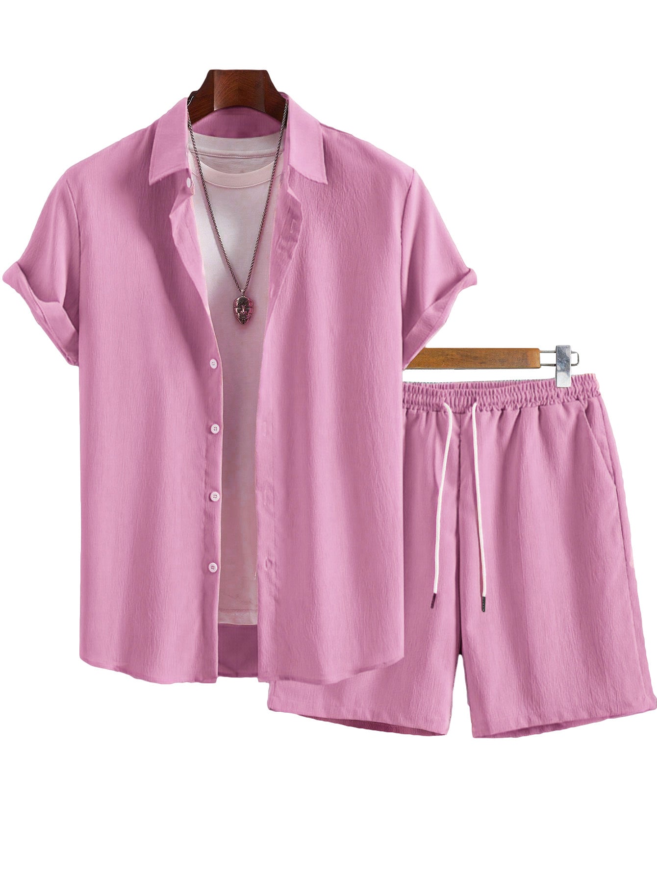 Pink shirt and shorts set on a white background