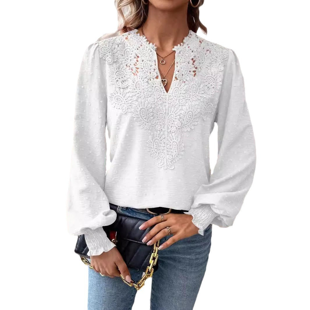 White lace blouse worn by a person on a white background