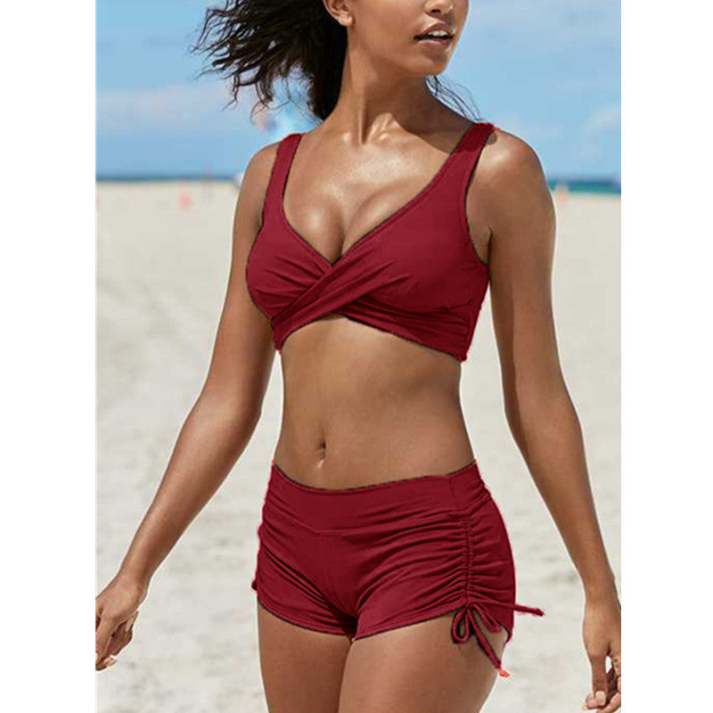 Woman wearing a red bikini on a beach