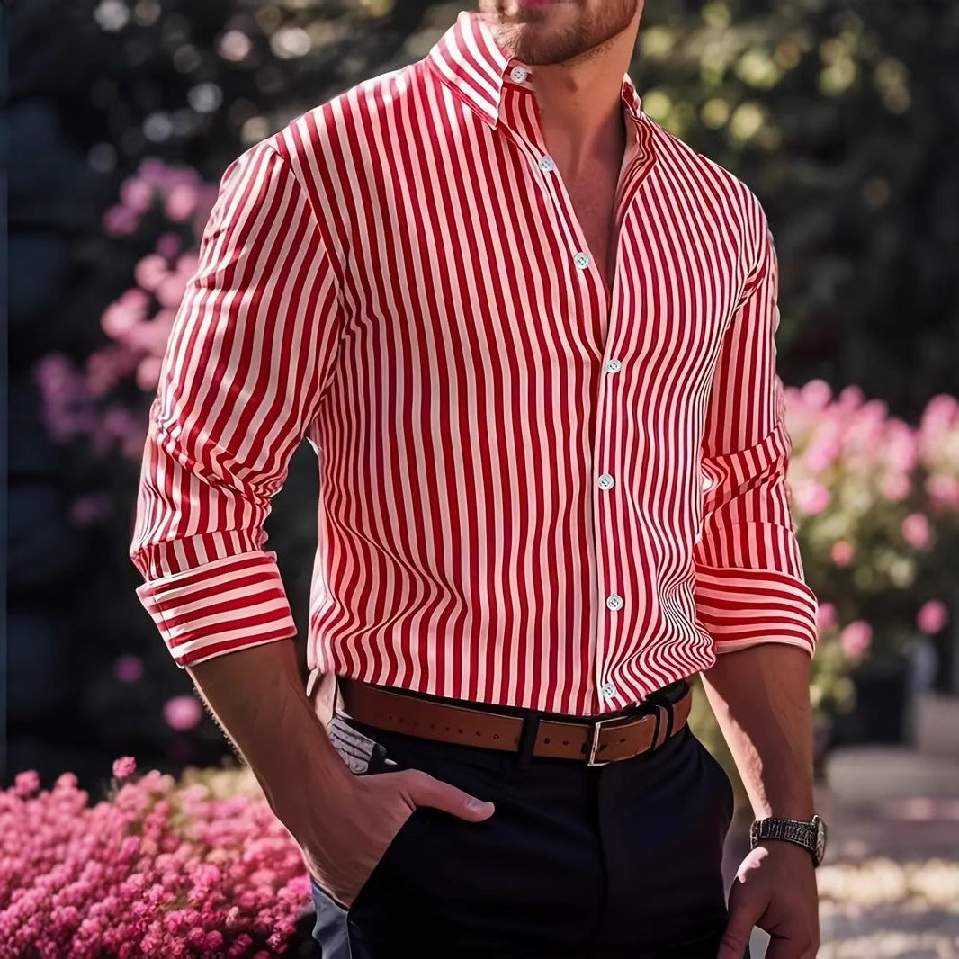 Person wearing a red and white striped shirt with a blurred floral background
