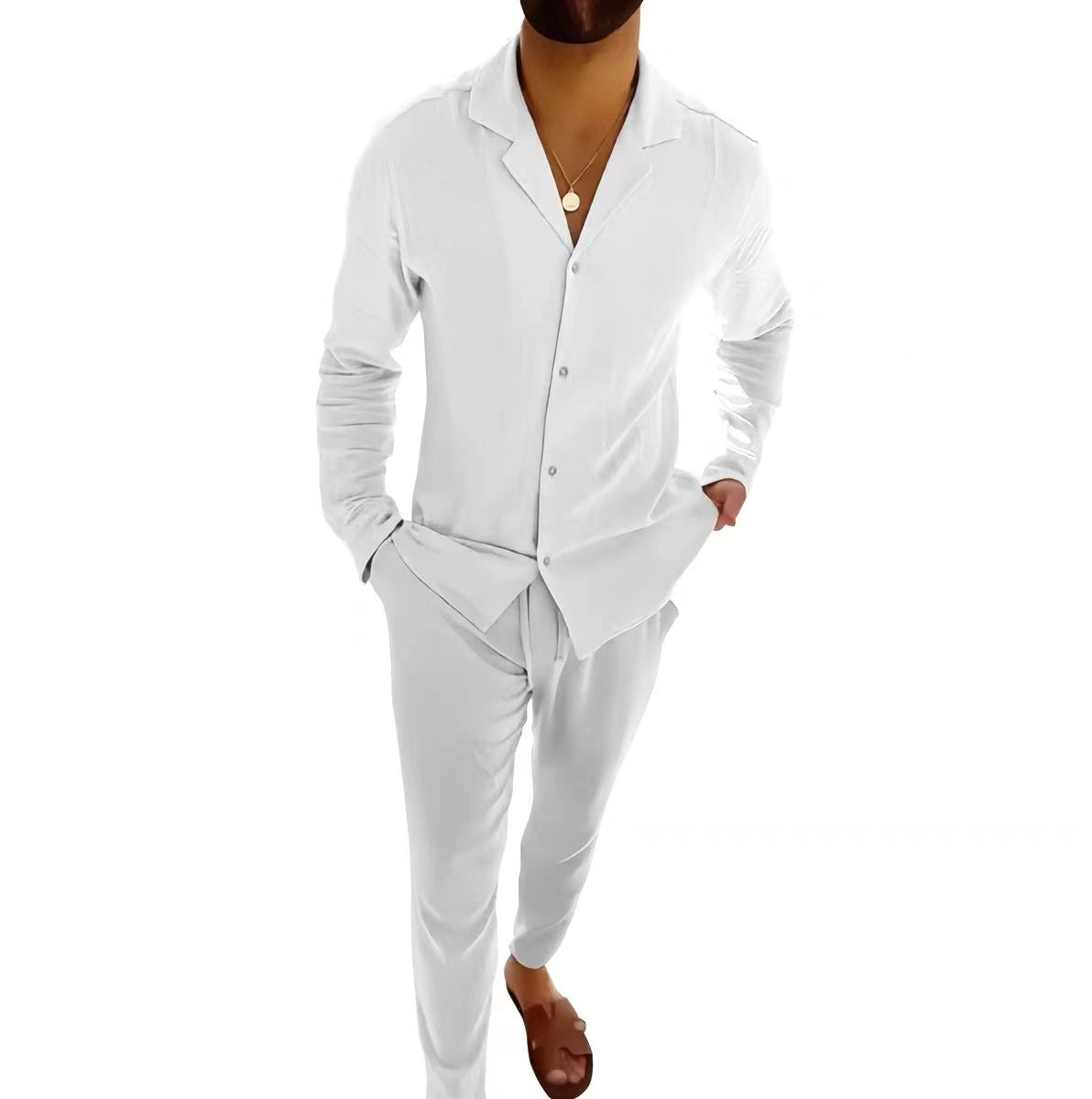 White pajama set with a shirt and pants on a white background