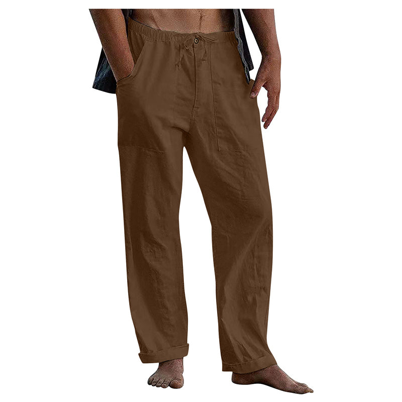 Brown pants worn by a person on a white background