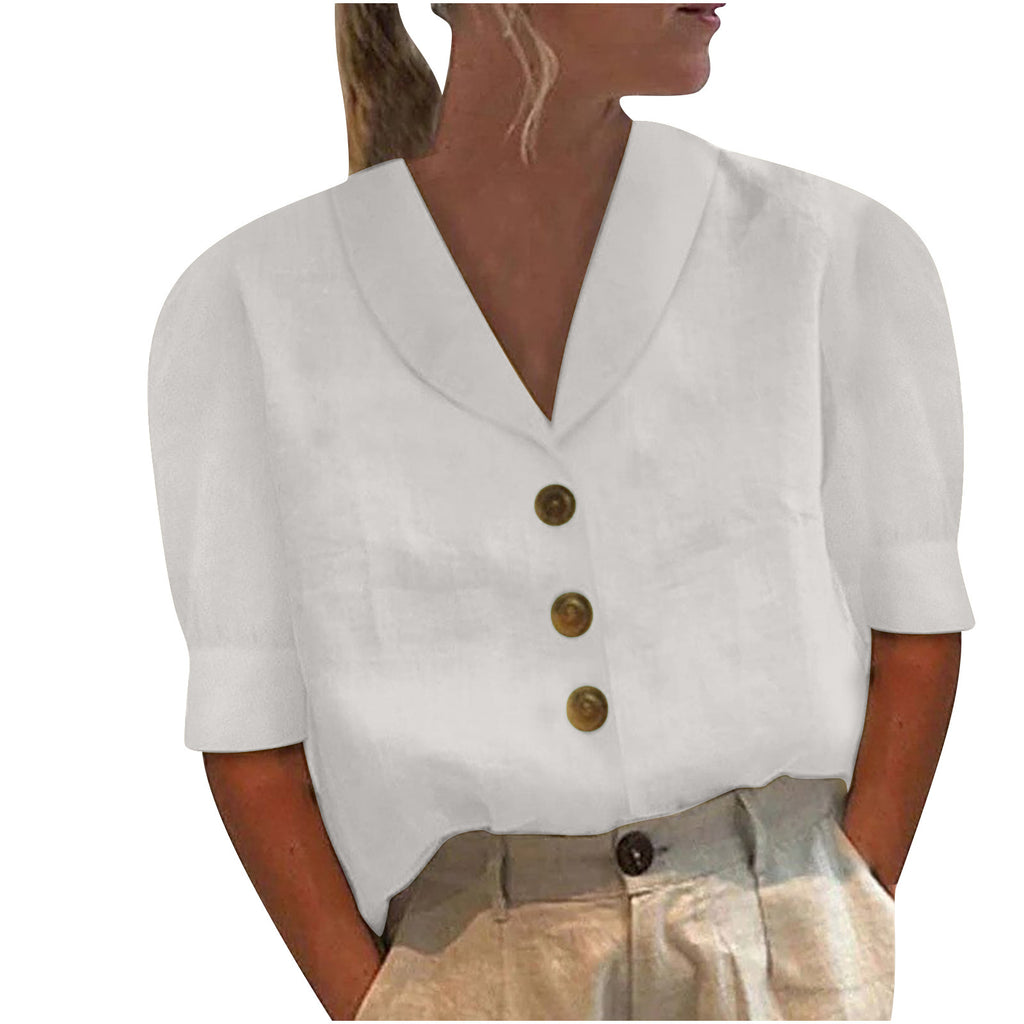 White short-sleeve button-up top worn by a person on a white background