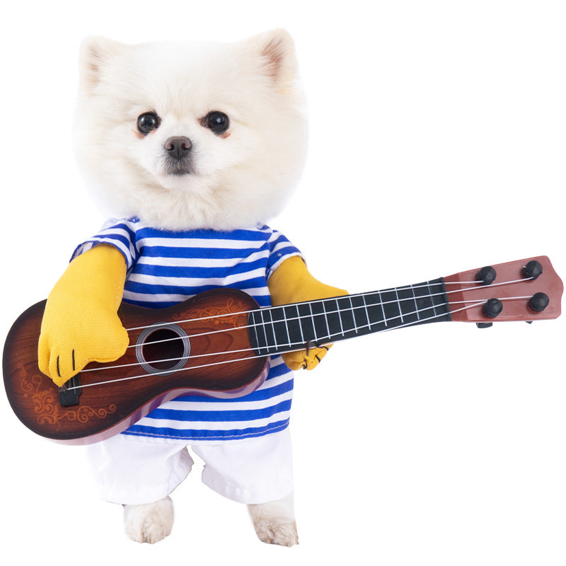White dog wearing a blue and white striped shirt and yellow gloves, holding a small guitar on a white background