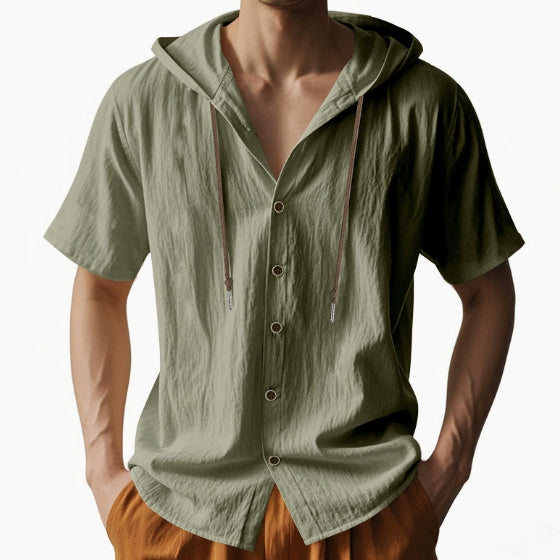 Green hooded shirt worn by a person on a white background