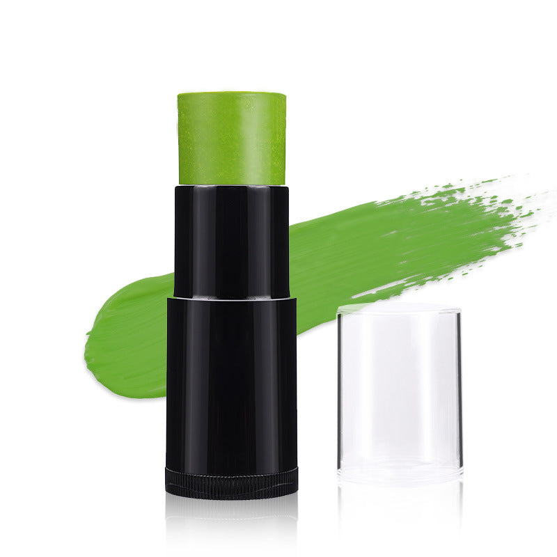 Green lipstick with black casing on a white background
