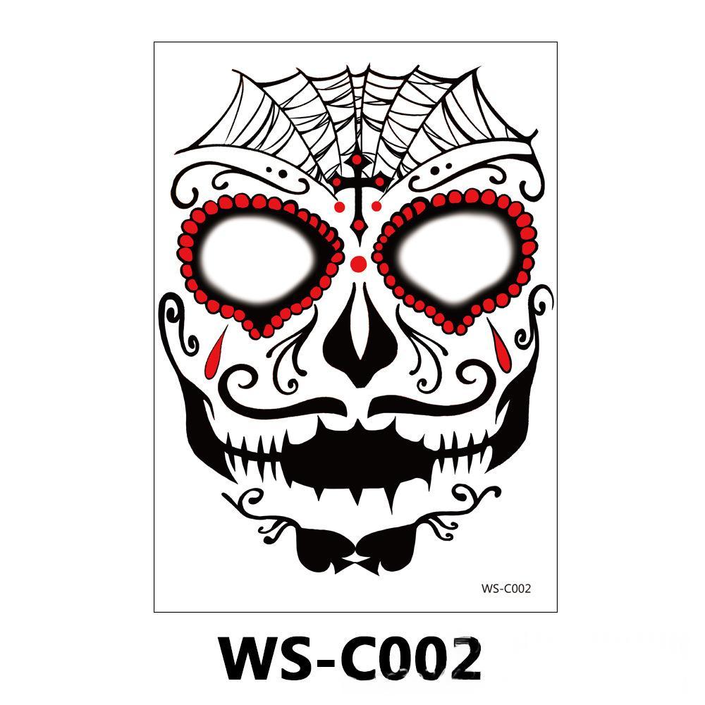 A Day of the Dead sugar skull temporary tattoo or decal design shown on a white rectangular card with the code WS-C002. The design features a black and white skull decorated with red beaded eye sockets, red teardrop accents, and a black spiderweb motif at the top.